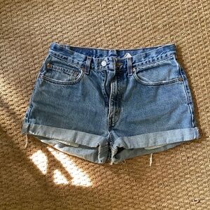Levi’s blue jean shorts.  Cut offs.  Size 32